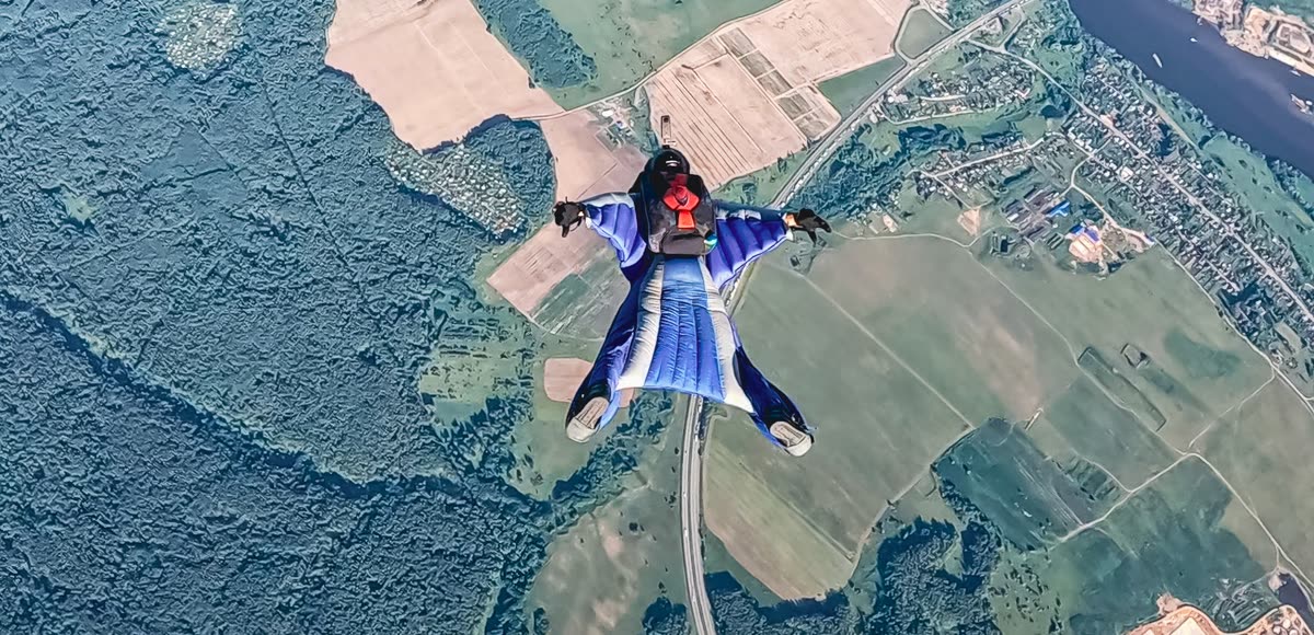 AFF student with two instructors in freefall
